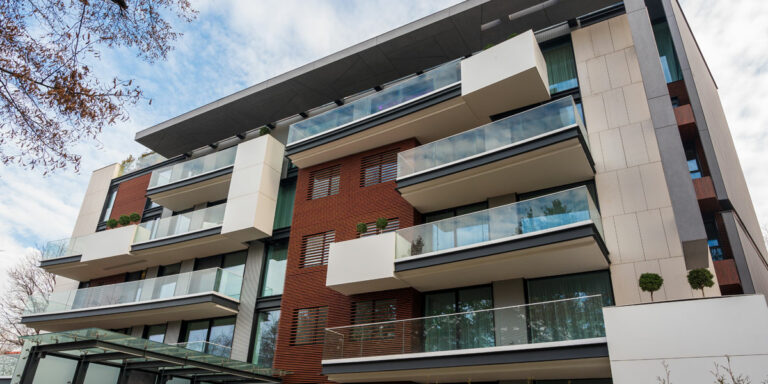 A Beginner’s guide to the conveyancing process Featured Page Image - picture of a residential apartment block.